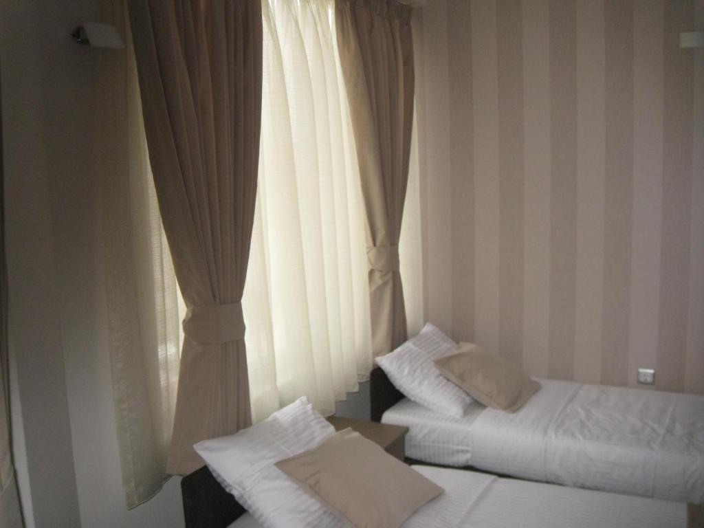 Domus Aparthotel Skopje Rom bilde